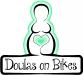 Logo of Doulas on Bikes line drawing of pregnant body with green heart