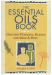 Yellow cover with bottles and plants of The Essential Oils Book