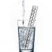 Glass of water filling with reusable stainless steel alkalinizing stick