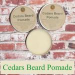 jars of Cedars Beard Pomade by Anarres against red bricks